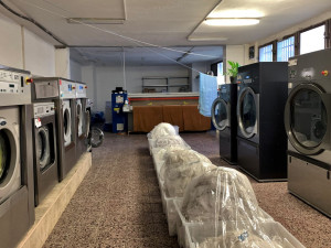 Obvykle býval v prádelně čilý ruch...