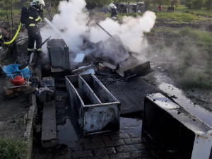 Požár v bezdomovecké osadě