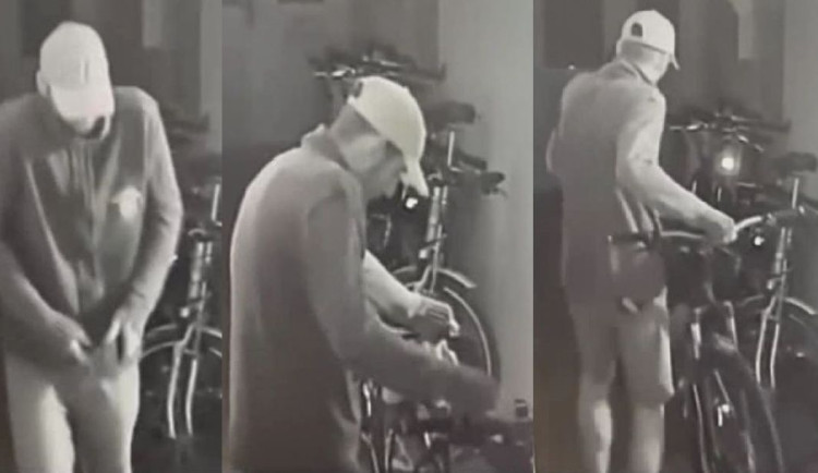 VIDEO: Zloděj kradl kolo na chodbě domu přímo pod bezpečnostní kamerou, teď po něm pátrá policie