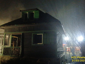 Dobývání středověkého hradu s vodním příkopem připomínal zásah hasičů u hořící chaty stojící na ostrůvku