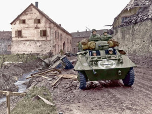 Typově stejné obrněnce M8 Greyhound Němci ukořistili Američanům a použili je ve Zhůří proti nim jako vražednou zbraň