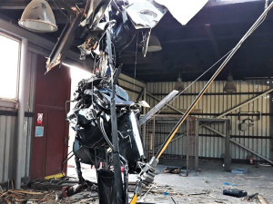 Trosky zříceného vrtulníku, ve kterém zahynuli čtyři lidé