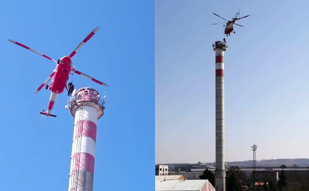 Muž při práci zkolaboval na plošině komína ve výšce asi 50 metrů, záchrana přišla z nebe