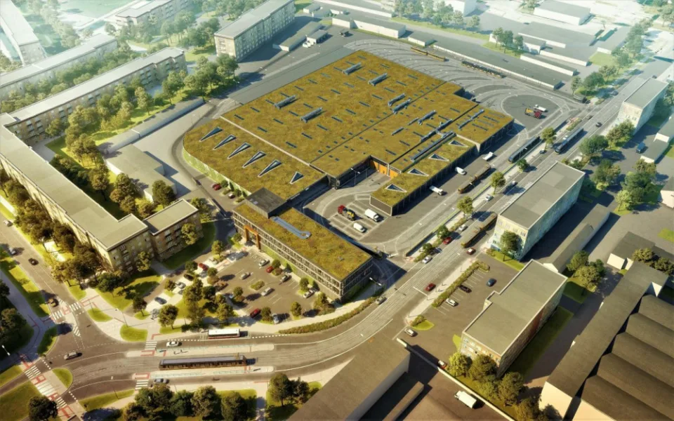 Vizualizace vozovny Slovany. Pozornost upoutá zejména obří zelená střecha